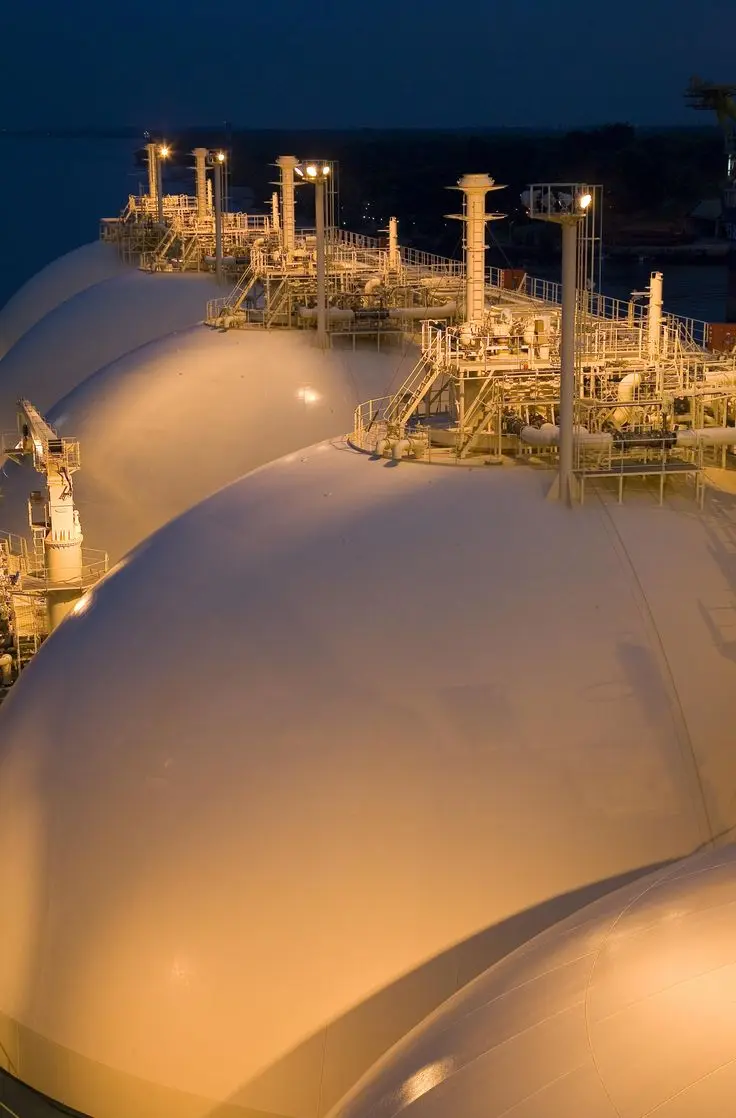 LNG fuel tanks on a carrier at dusk