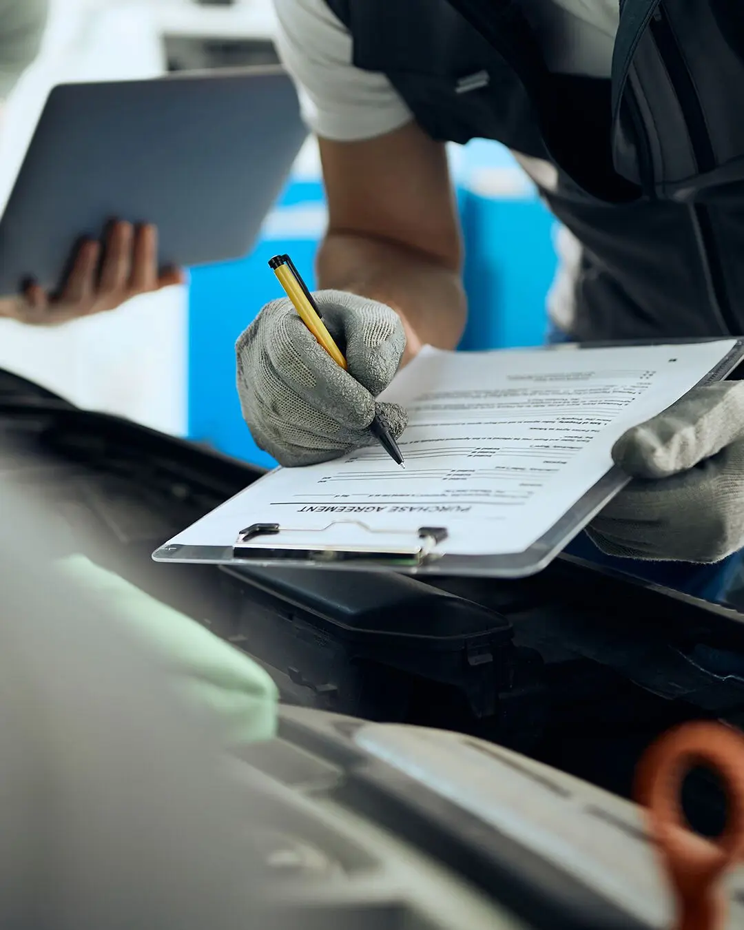 Engineer filling in a logbook entry