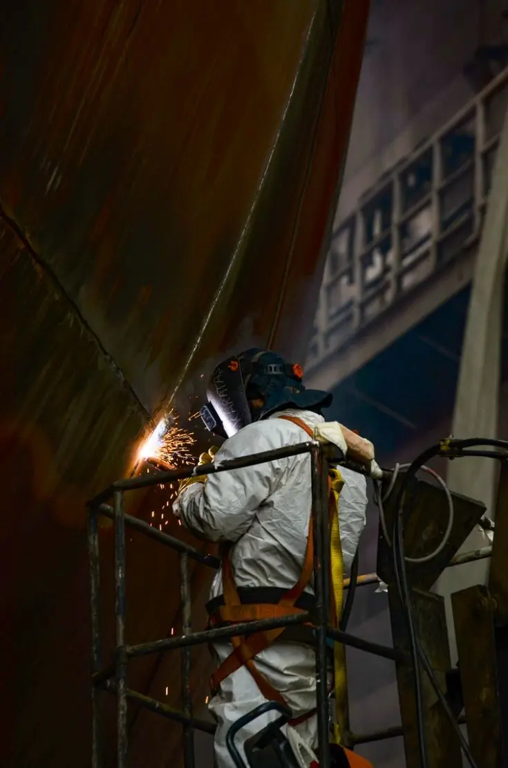 Welder carrying out a hull work order